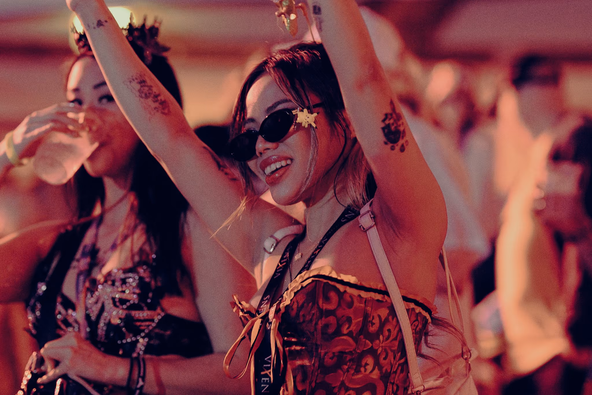 EDM festival goer dancing at a DJ set on Groove Cruise 2026.