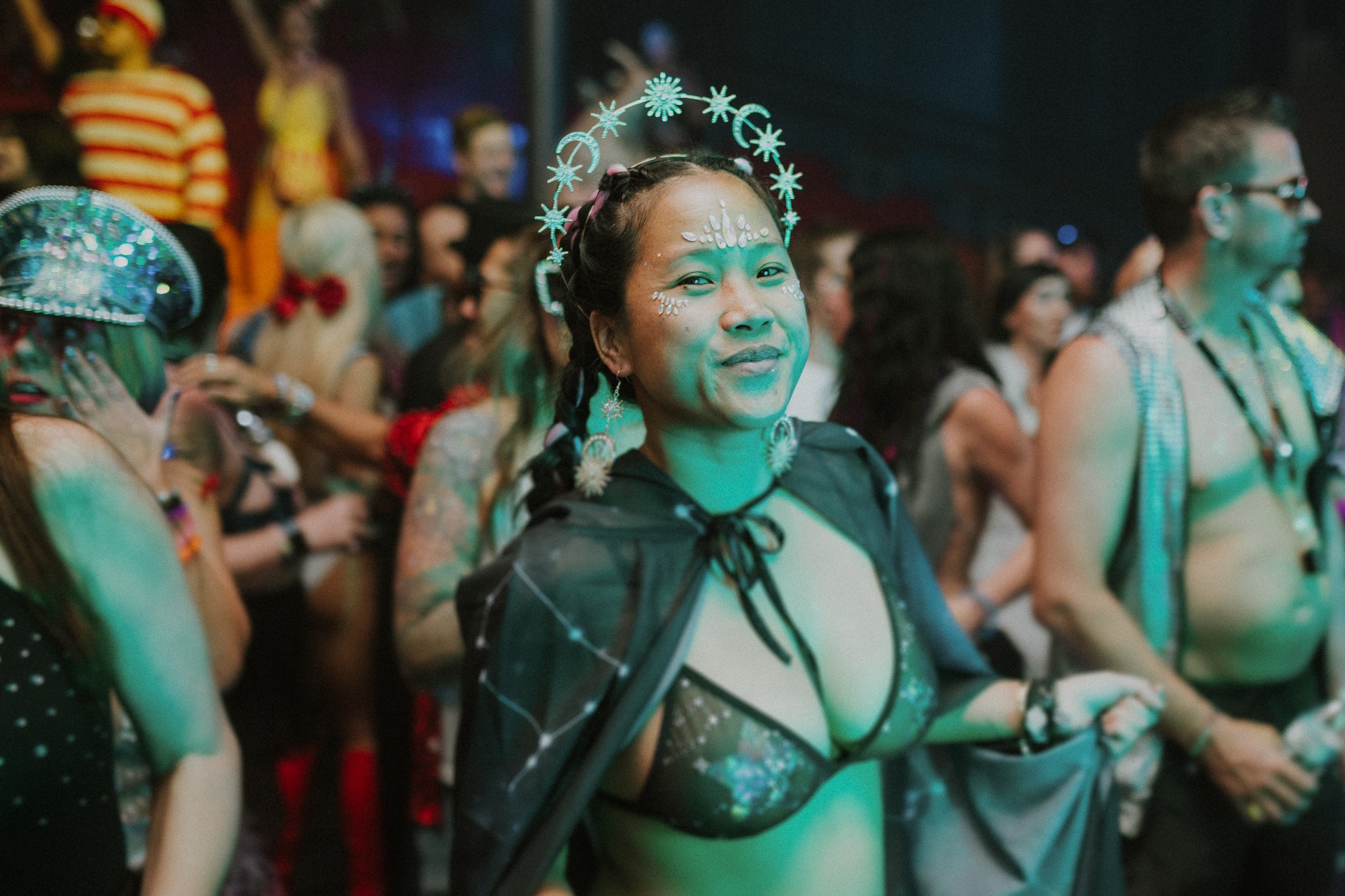  Woman wearing celestial themed outfit on a rave cruise