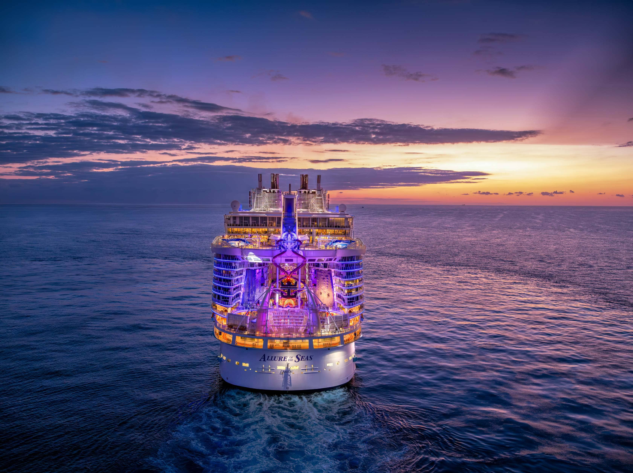  Rave cruise aboard Allure of the Seas sailing at sunset