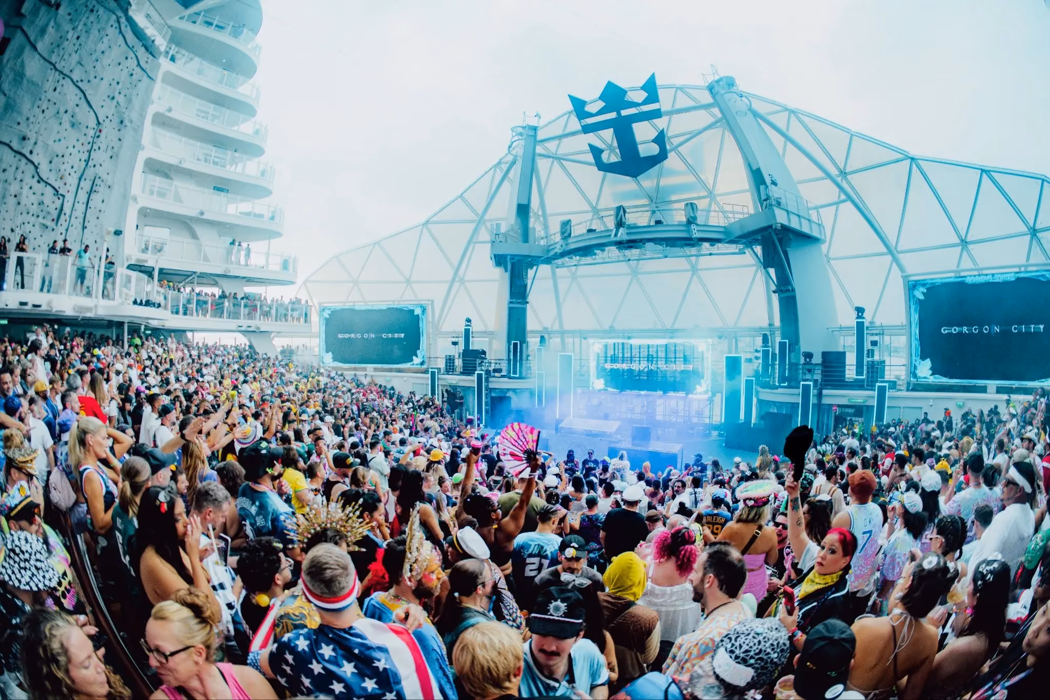 EDM cruise crowd in the Aquatheater on Royal Caribbean’s Wonder of the Seas.