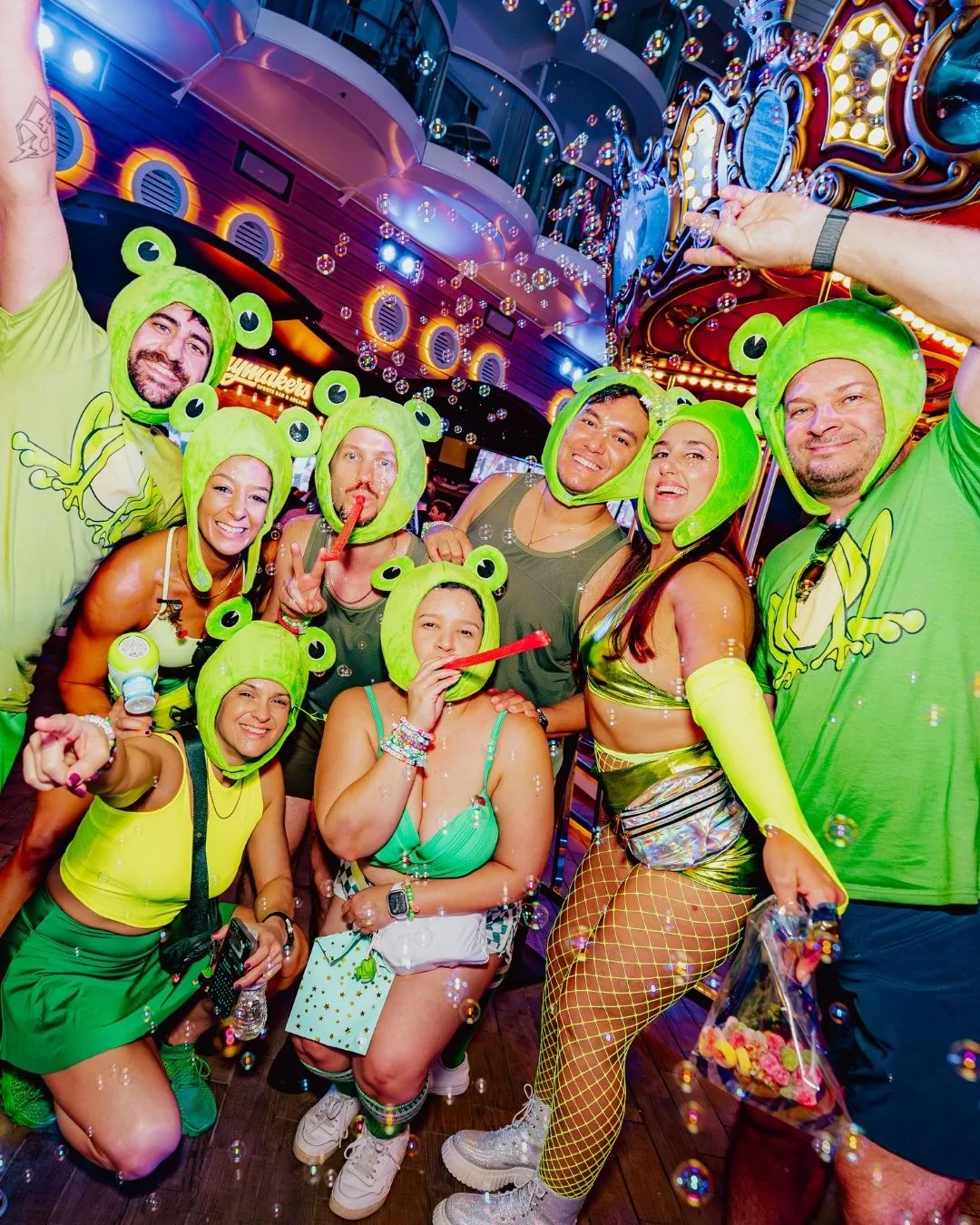 Groove Cruise festival goers dressed in themed rave attire.