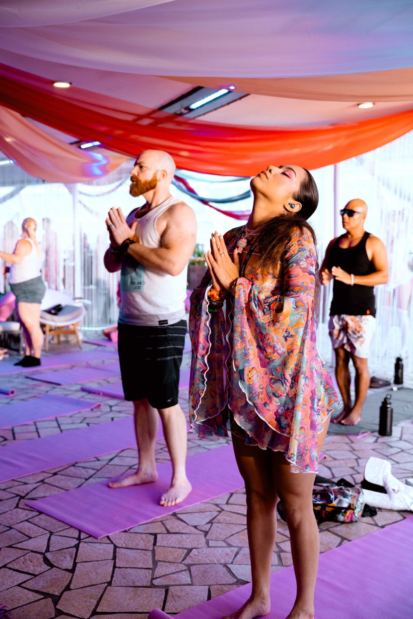 Couple participating in a wellness activity aboard a festival cruise