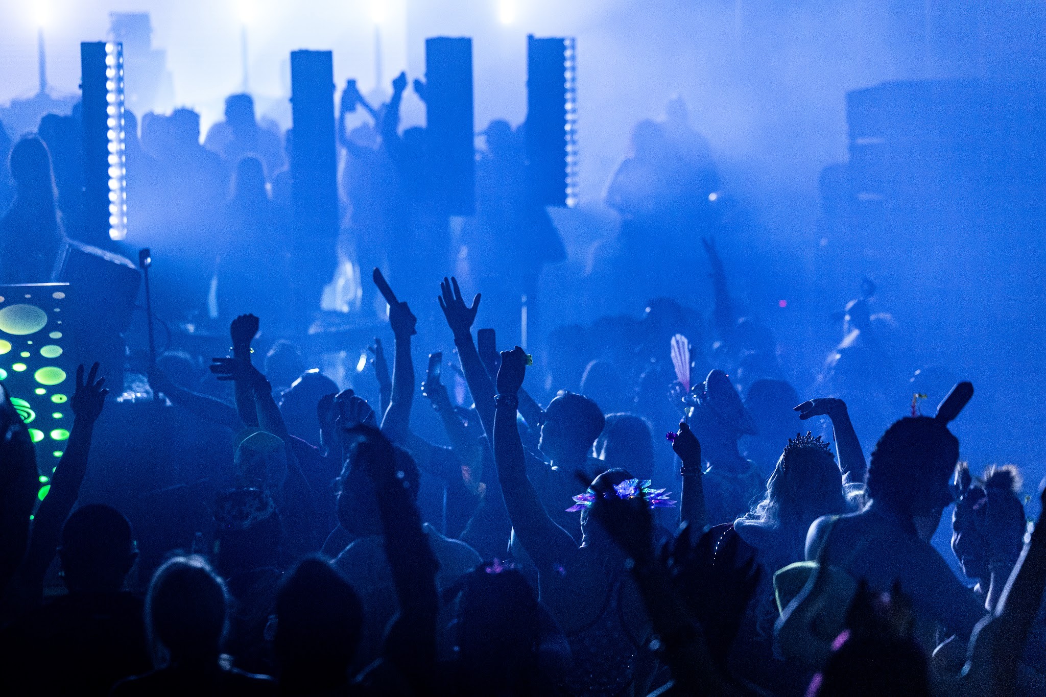  Trance fans dancing together during an Embark set on Groove Cruise.