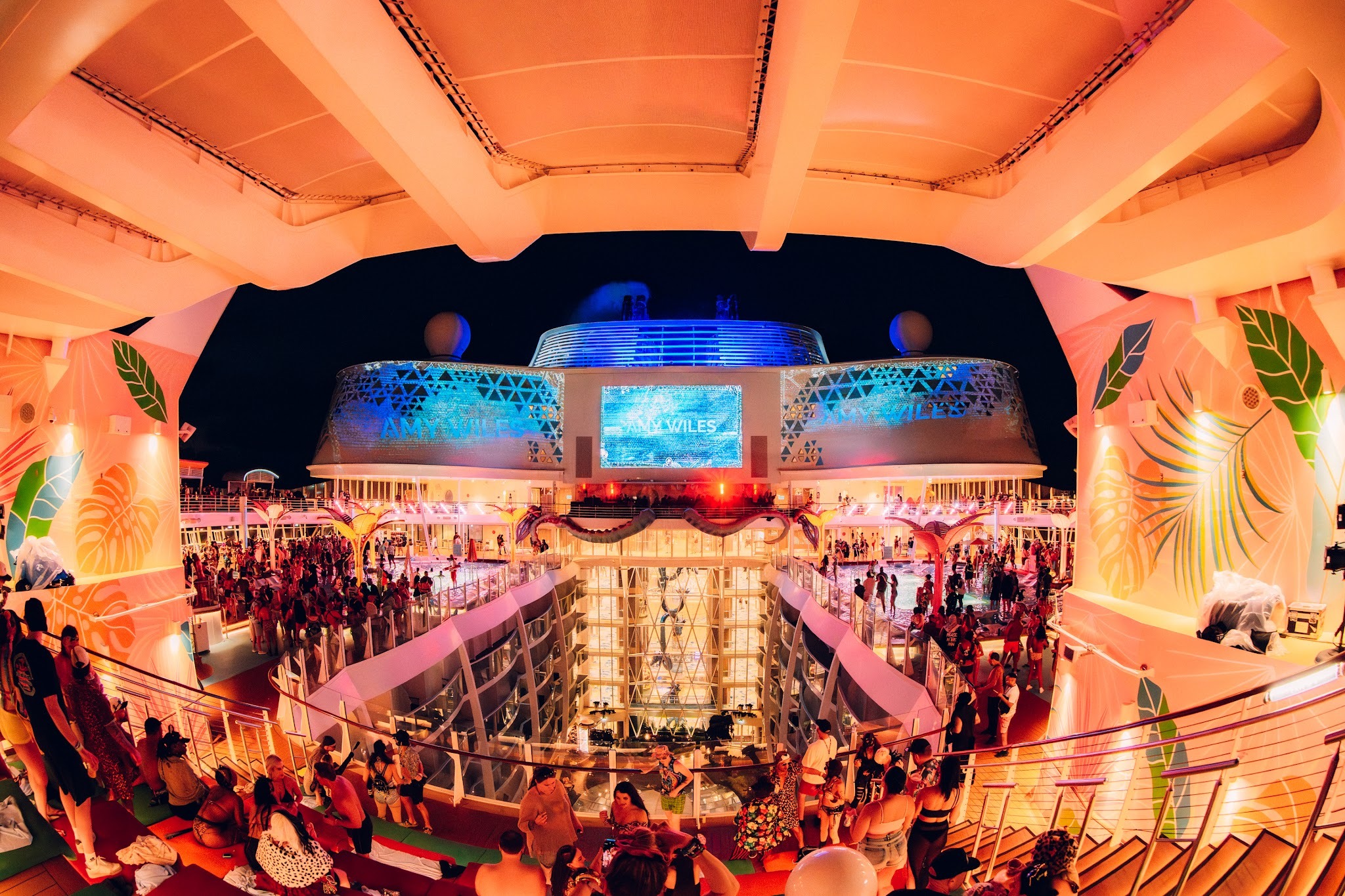 Amy Wiles performing a nighttime trance set by the pool deck on Groove Cruise.