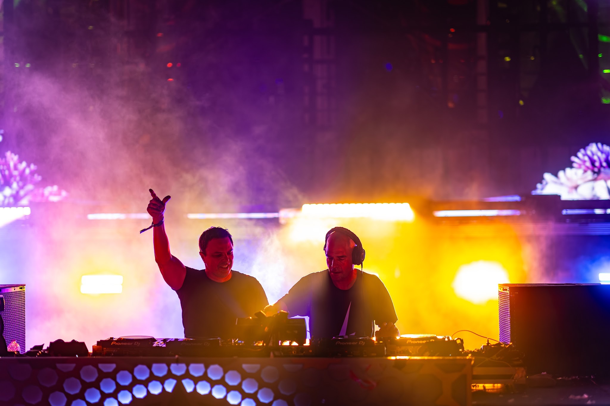 Markus Schulz and Gabriel & Dresden performing a B2B trance set on a music festival cruise.‍