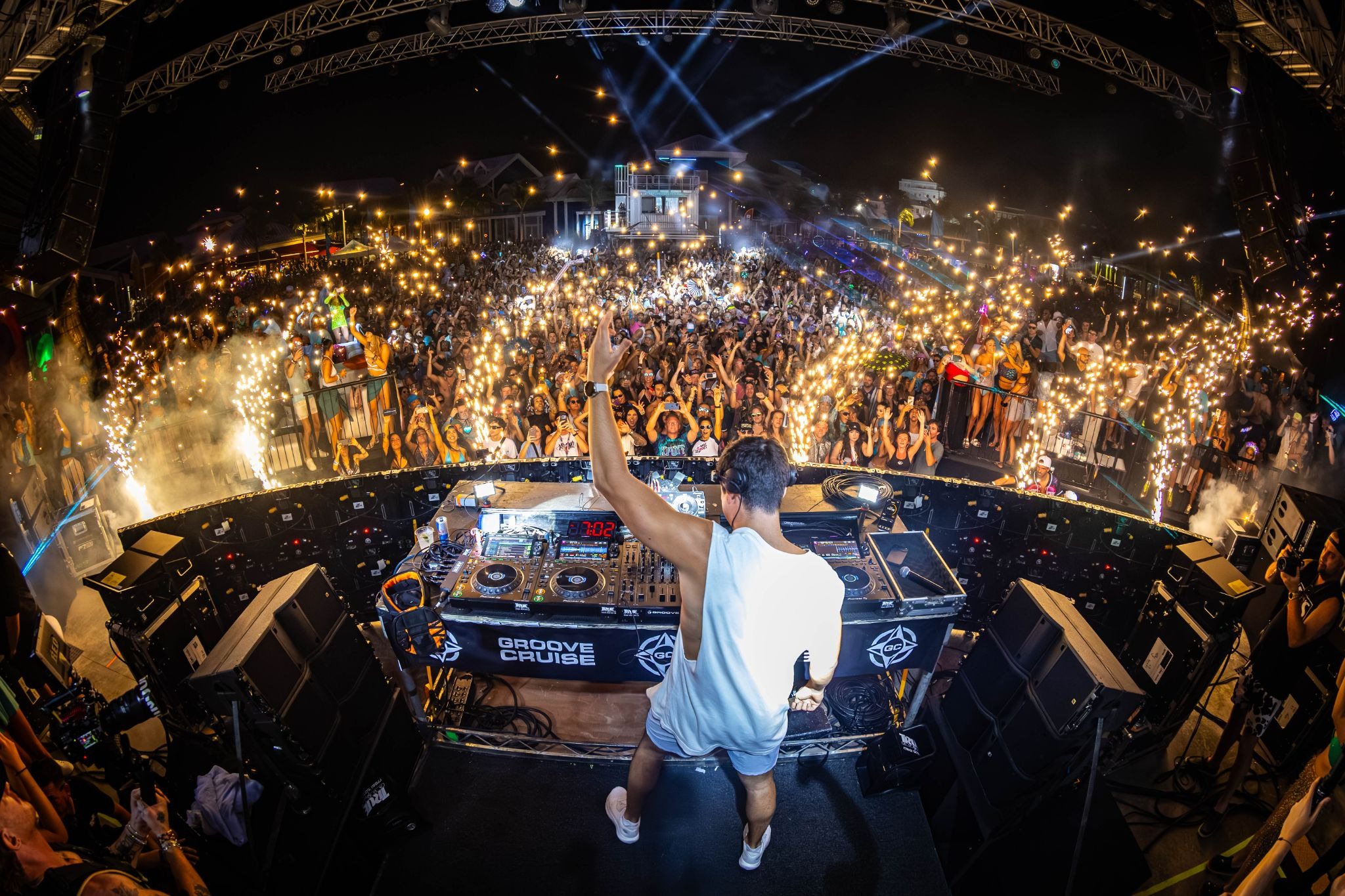 John Summit performing for a packed crowd on Groove Cruise 2026