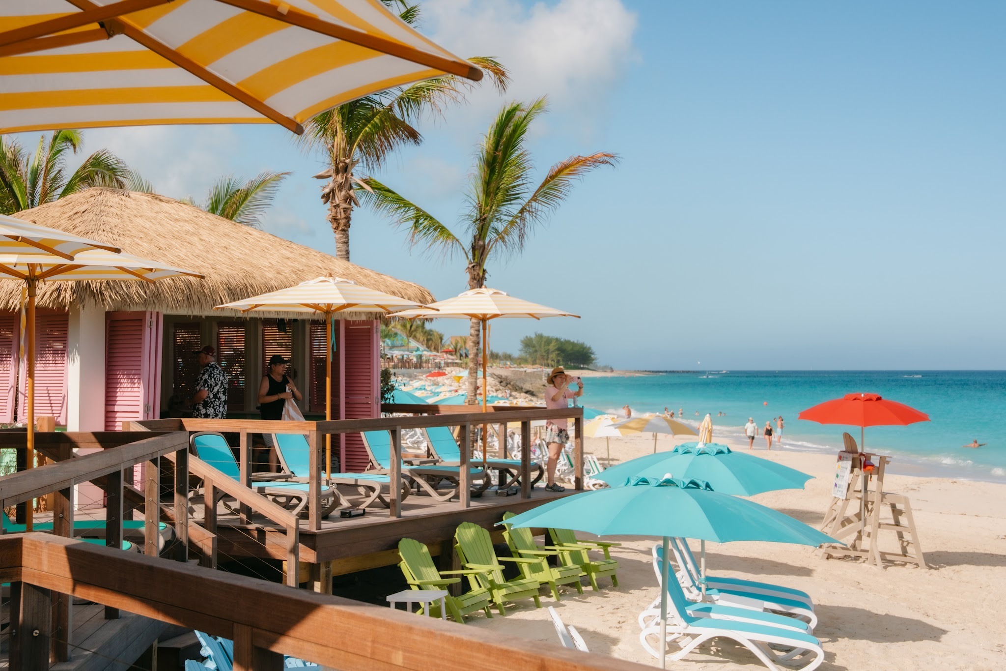 Scenic beach view at Royal Beach Club Paradise Island, featuring private beachfront cabanas overlooking the turquoise waters of the Bahamas.