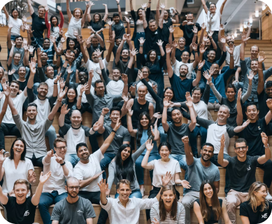 square image of many team members cheering