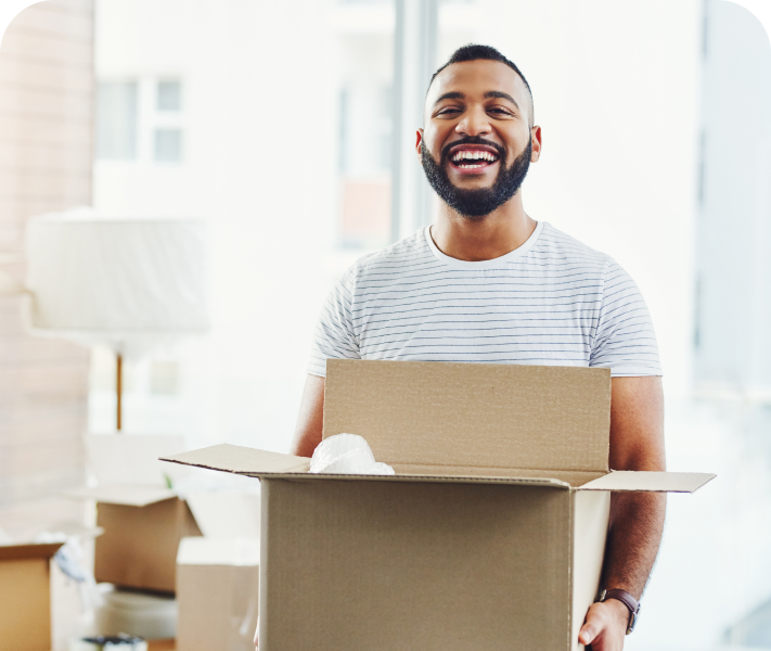 man holding cardboard box moving