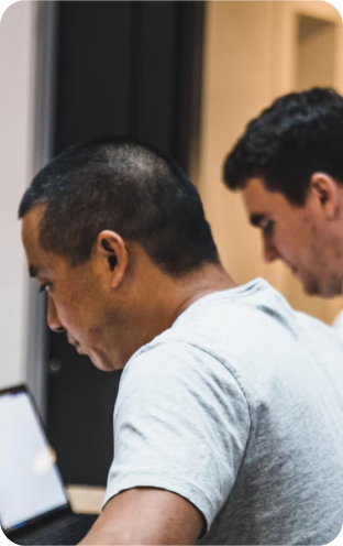 view of mans back looking focused at something