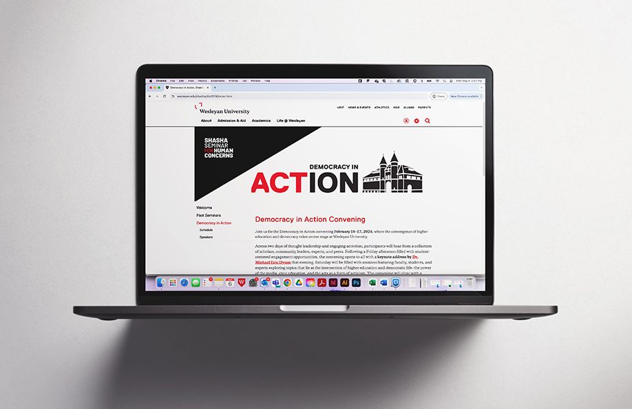 Laptop screen showing a webpage for the Democracy in Action Shasha Seminar