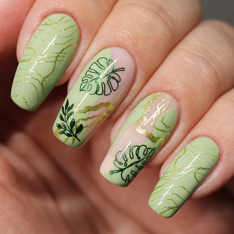Nails painted with houseplant nail art