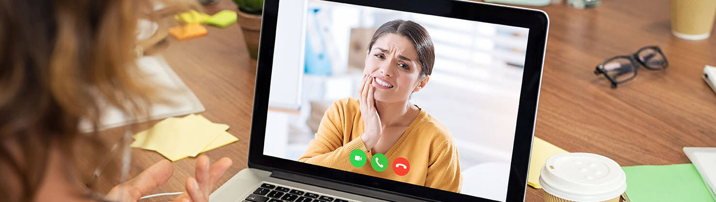 Patient connecting with a dentist by video call
