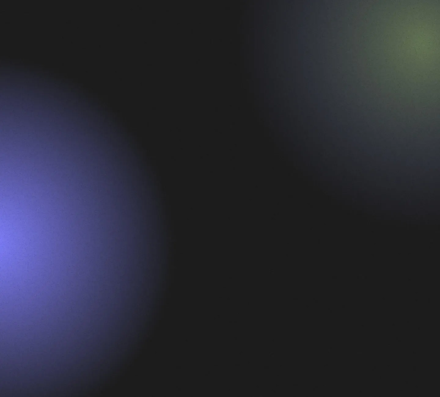 Abstract dark background with blurred blue and green light circles.