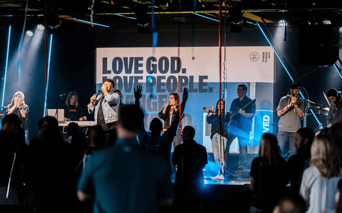 People in church worshiping