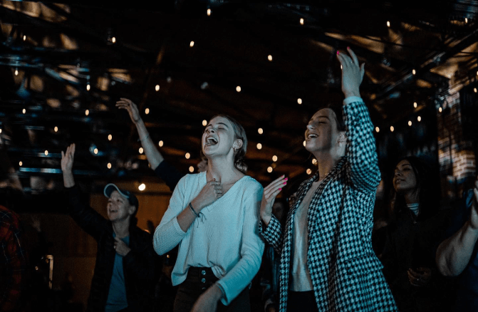 Two girls worshiping