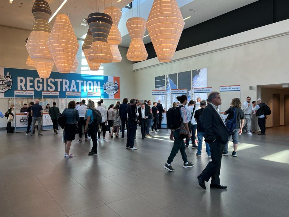 Large crowd gathered at registration for ICBC Berlin 2022, showing strong event attendance.