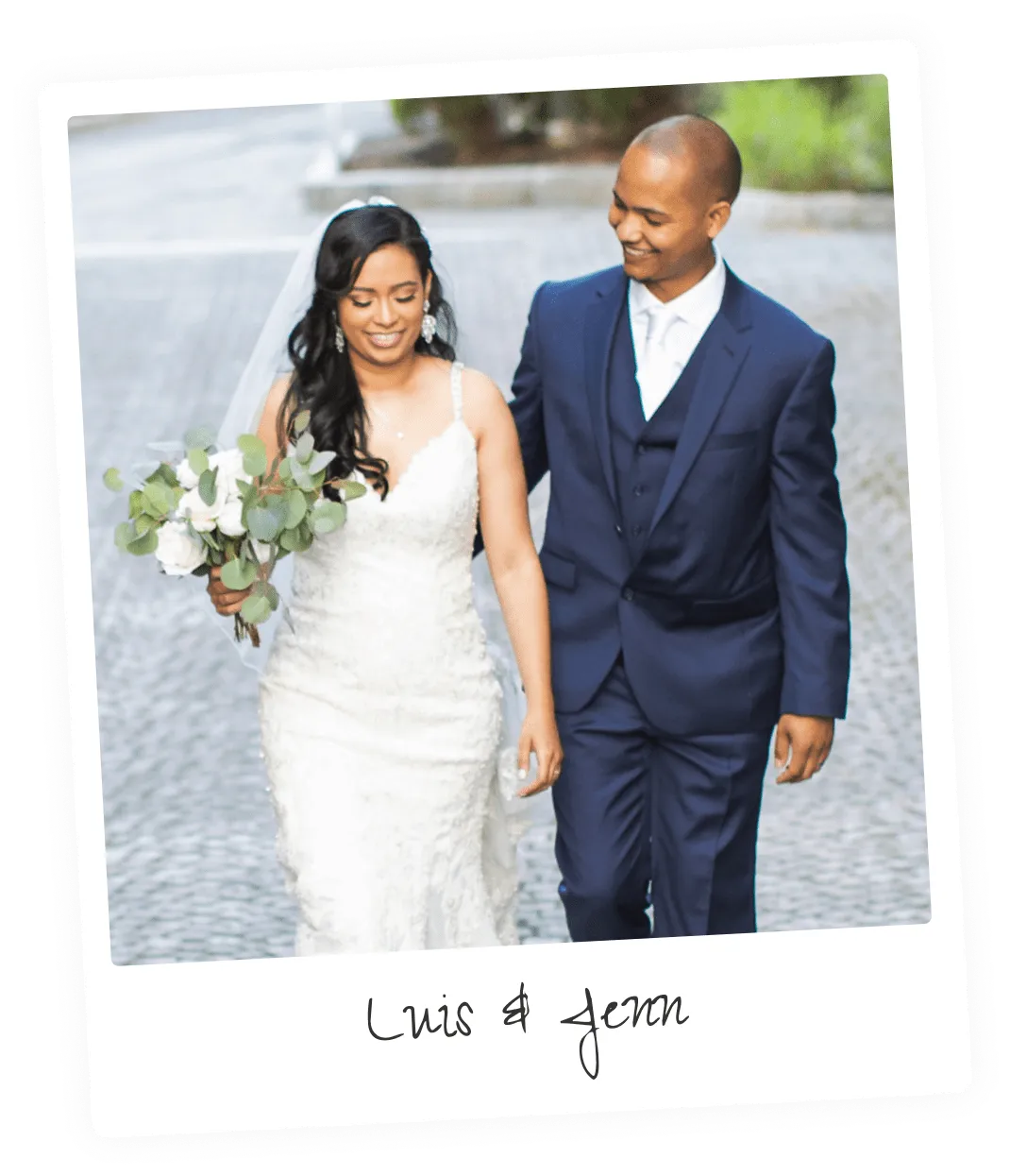 Happy bride and groom walking down path