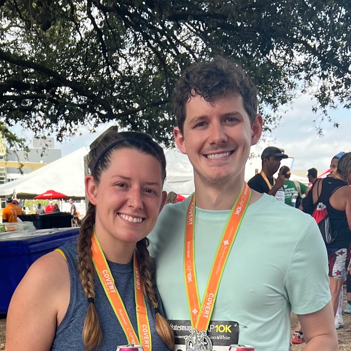 Amy and her brother after Austin's Cap 10K race.