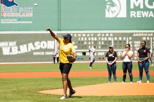 Take the Lead Night throwing the first pitch