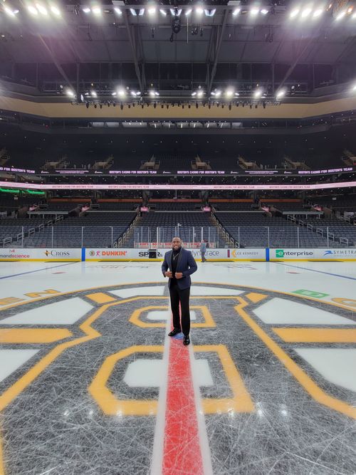 Jae posing on the Bruins ice
