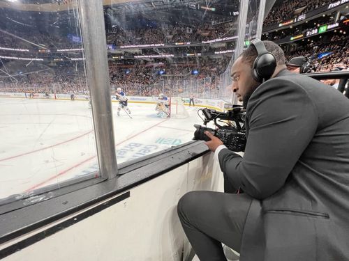 Jae filming for the Bruins PR team