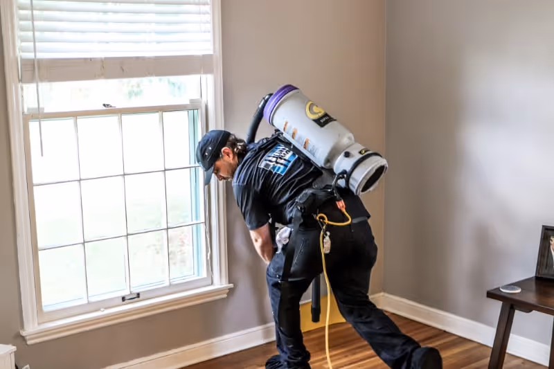 vacuuming around home after duct cleaning