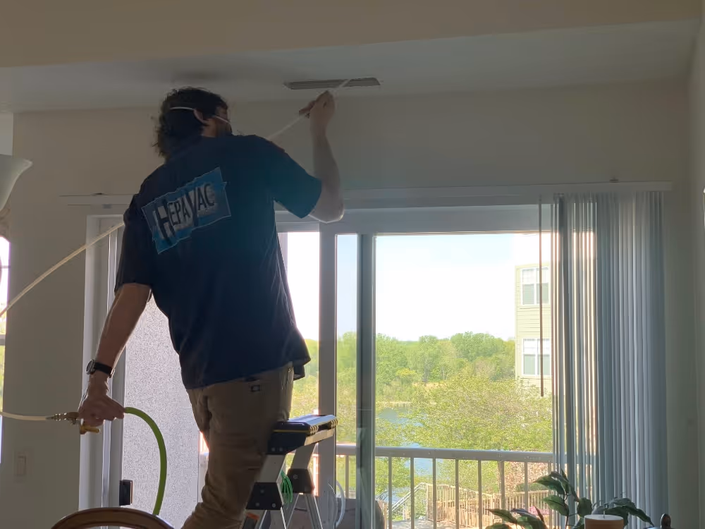 cleaning ceiling air ducts