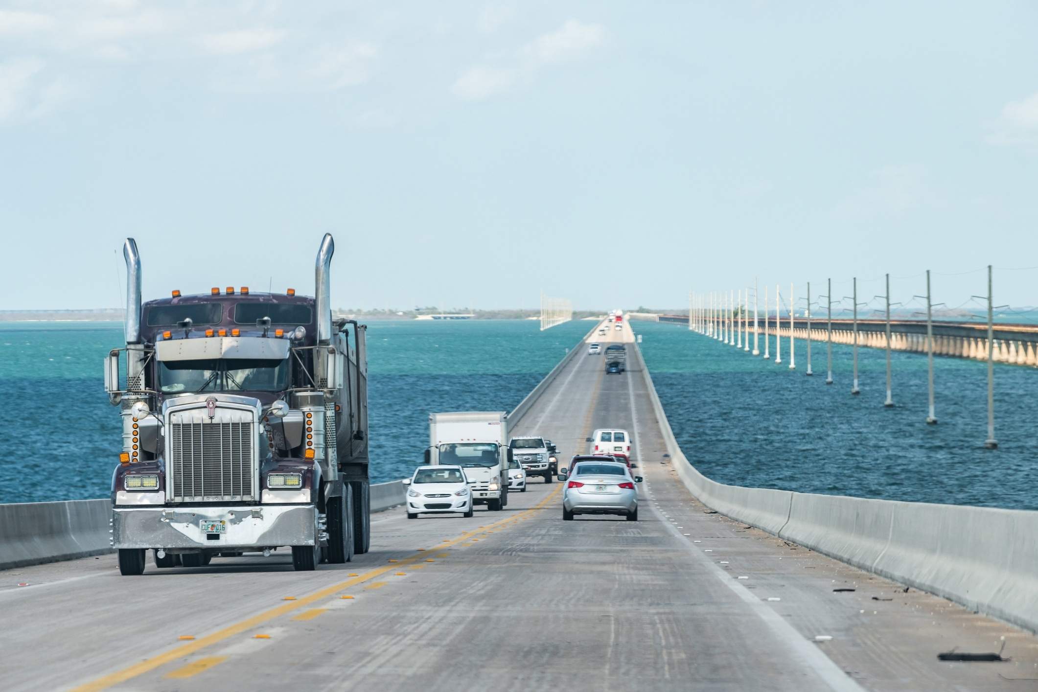 View from a car driving over a Florida bridge, illustrating Florida truck accident statistics.