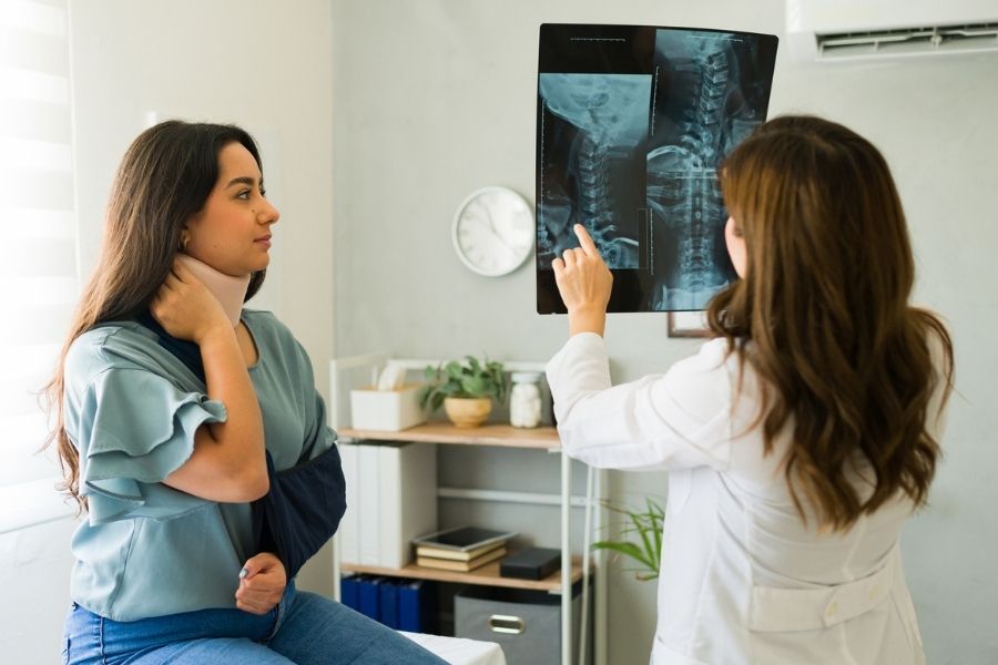 Woman in neck brace, symbolizing the need for a Coral Springs personal injury attorney.
