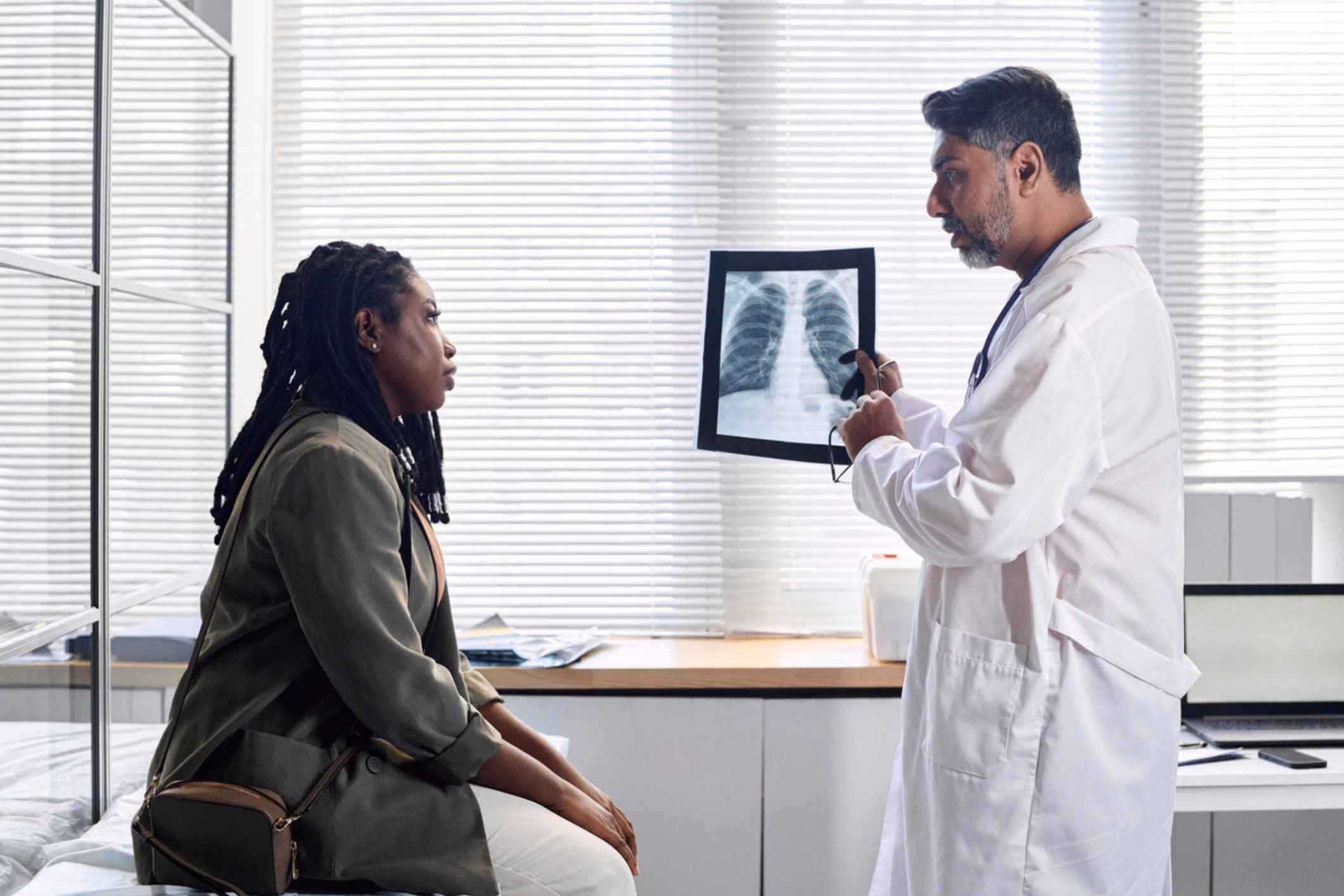 Patient meeting with doctor, representing a Coral Springs medical malpractice lawyer case.