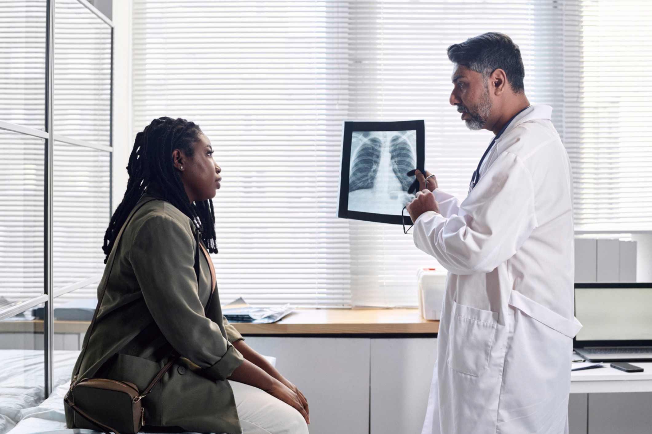 Patient meeting with doctor, representing a Coral Springs medical malpractice lawyer case.