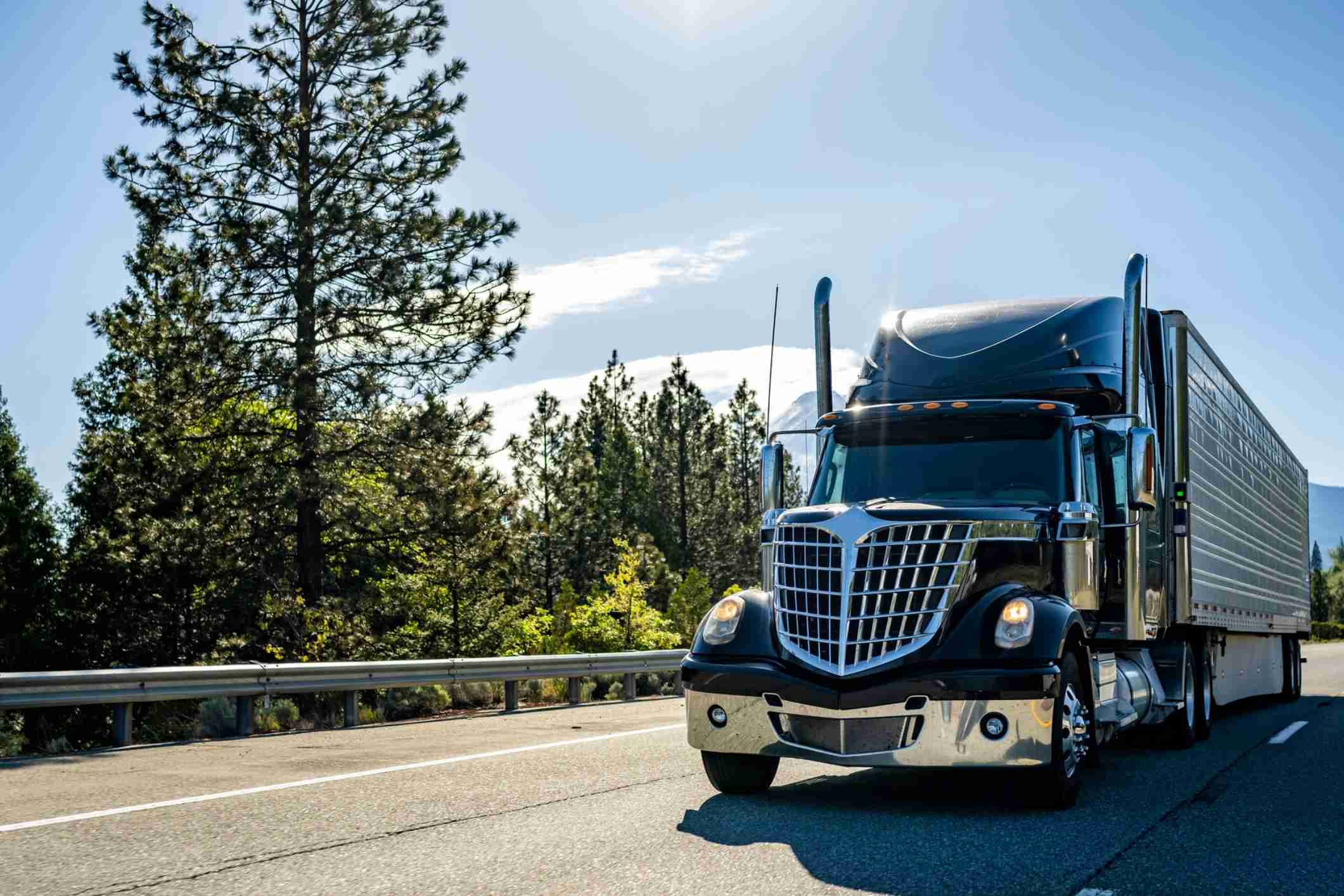 Semi-truck transporting cargo on highway, representing Pine Hills truck accident lawyer cases.