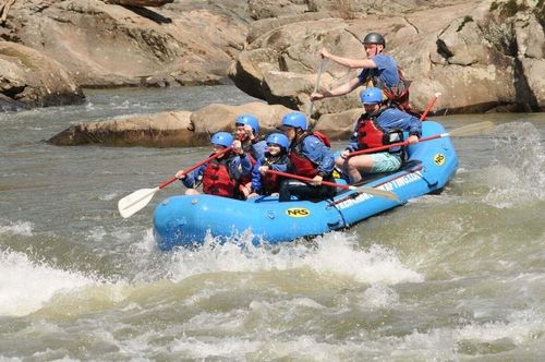 excited group whitewater rafting