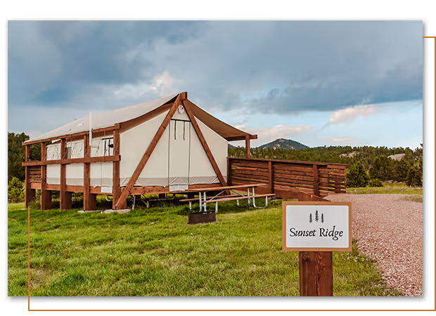 outside view of Sunset Ridge glamping tent at Buffalo Ridge Camp Resort in Custer, SD