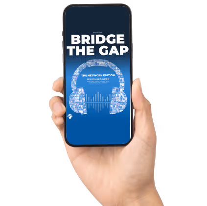 Hand holding phone with the Bridge The Gap lol