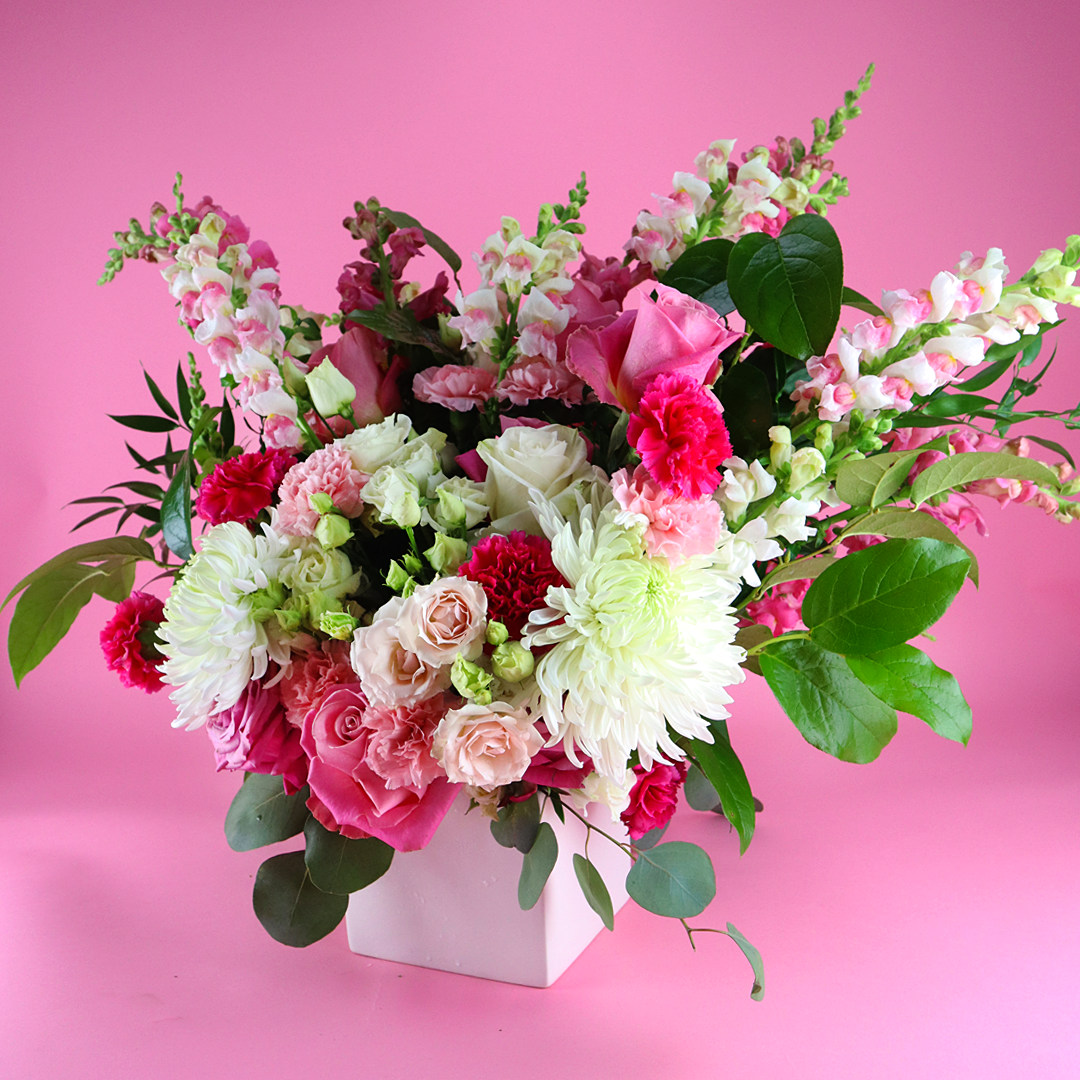 Still Blooming bouquet with pink, white and green flowers.