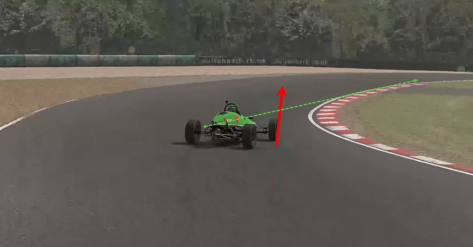 Green sim car on a race track turning a corner with a red arrow pointing up