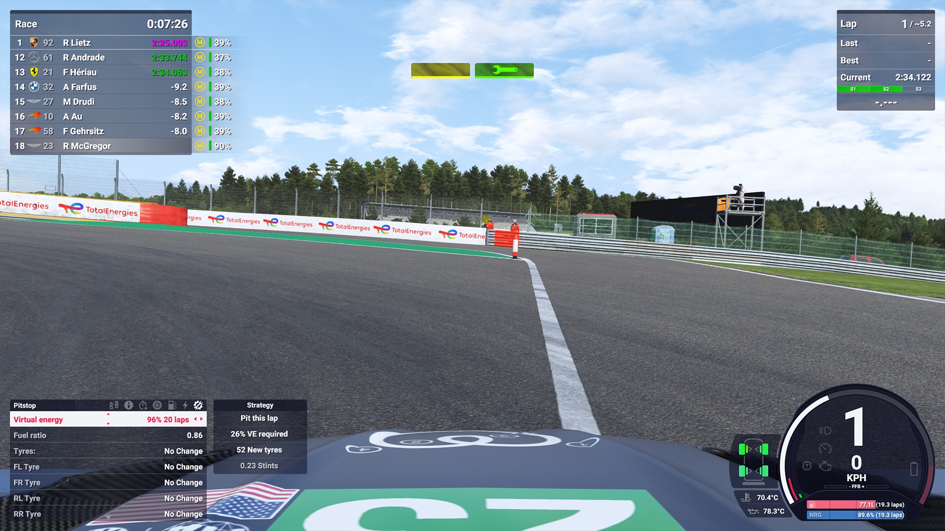 Le Mans Ultimate cockpit view displaying the pit strategy menu with virtual energy requirements, fuel ratio settings, tyre selections, and estimated stint length during a WEC race.