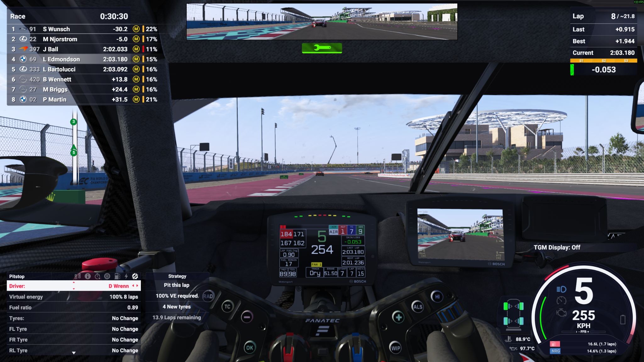 Le Mans Ultimate cockpit view showing the pit strategy menu with virtual energy, fuel settings, tyre selections, and race telemetry during a Hypercar endurance race.