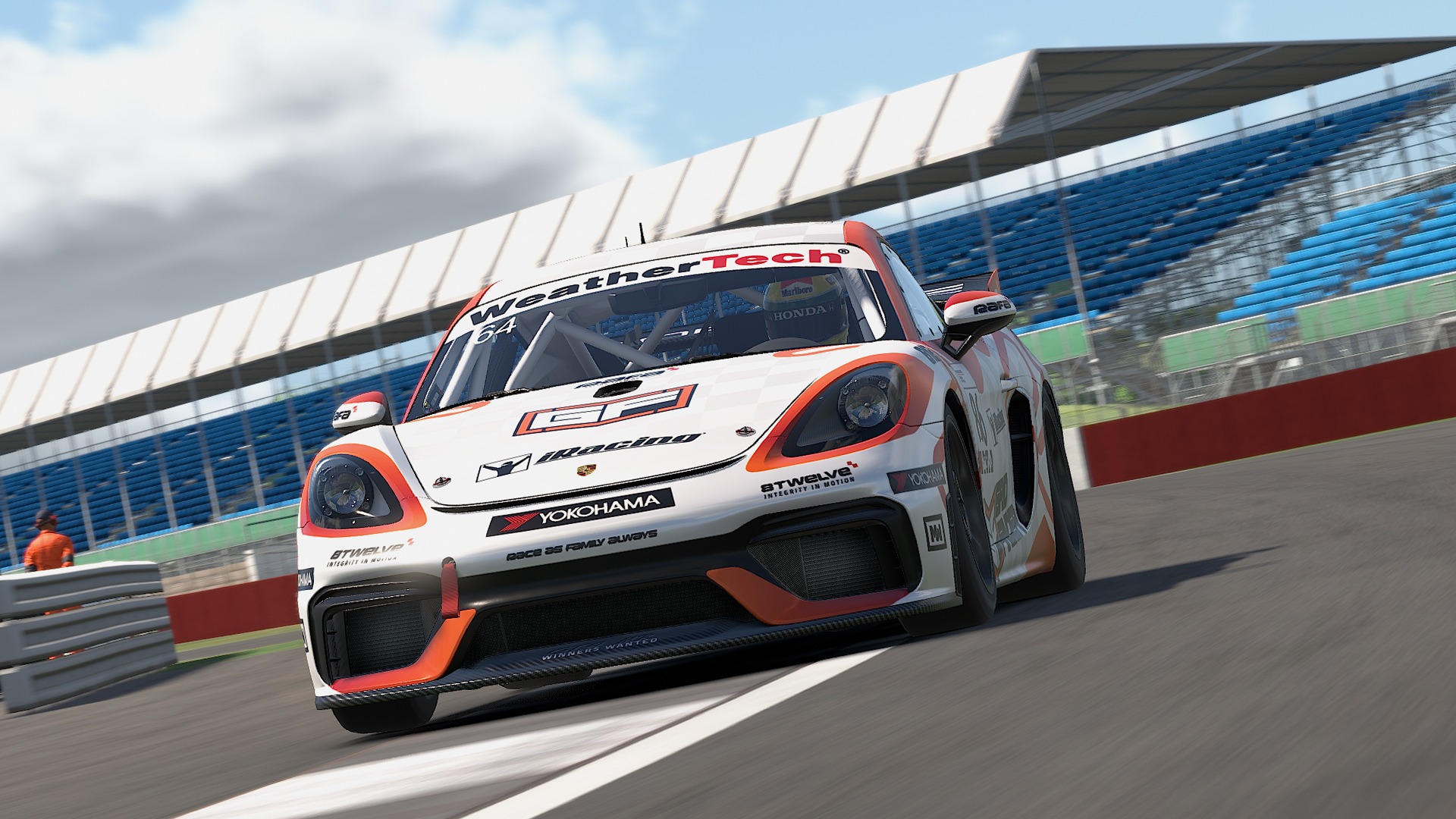 Porsche 718 Cayman GT4 racing at Silverstone in iRacing