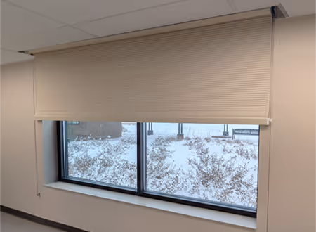 Bulletproof window shade with cable guides