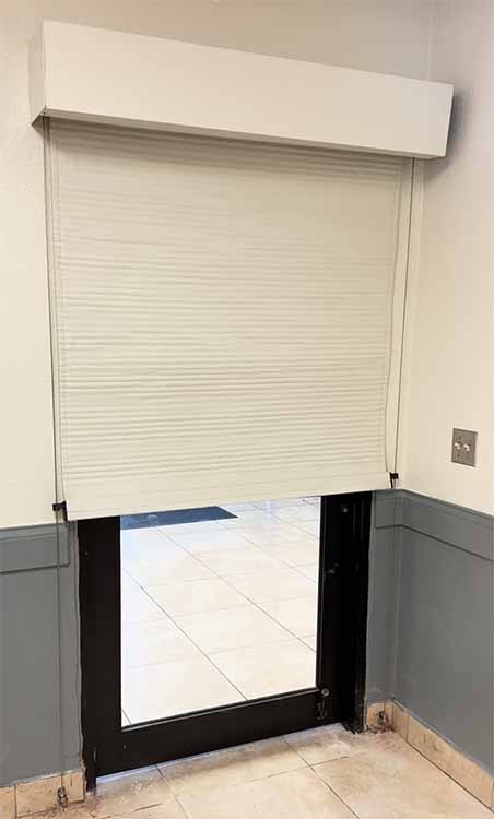 Bulletproof door shield, half deployed