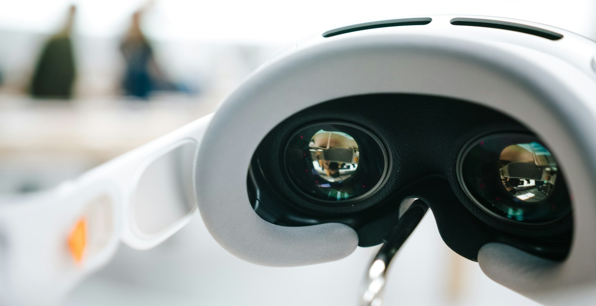 A Meta Quest headsets shown from the back. We're looking through the lenses