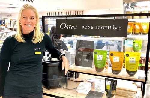 A picture of Catherine Farrant next to Ossa organic products