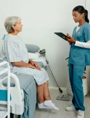 Nurse asking a patient questions