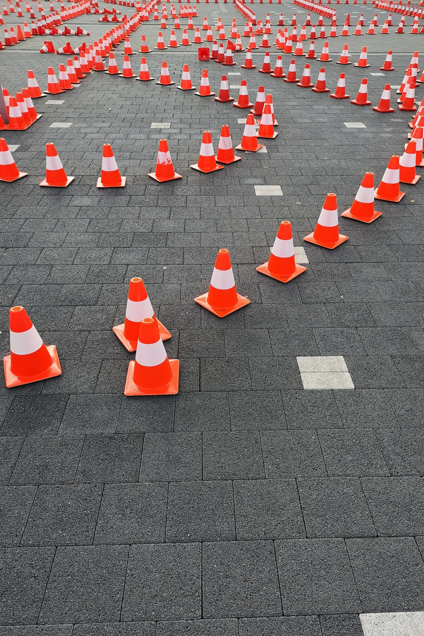Obstacles in Building Product AI, represented by orange traffic cones creating an obstacle course