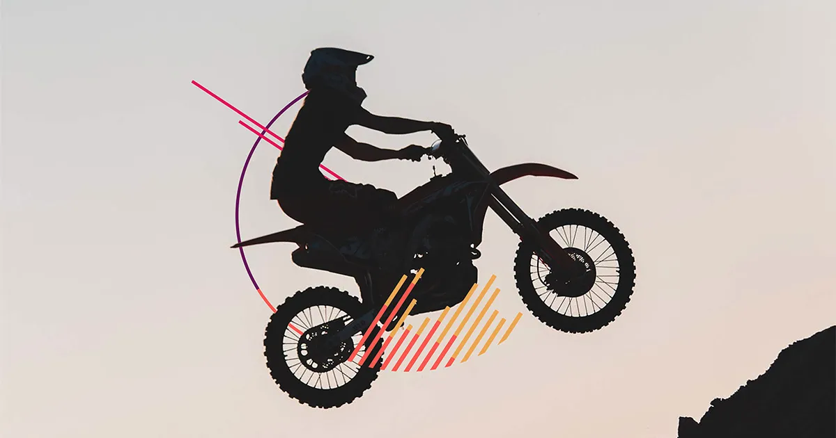 Why You Need to Evel Knievel the AI Gap, a silhouette of motorcyclist in midair accented with sunset colors of red, orange and yellow