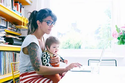 Mom working with child