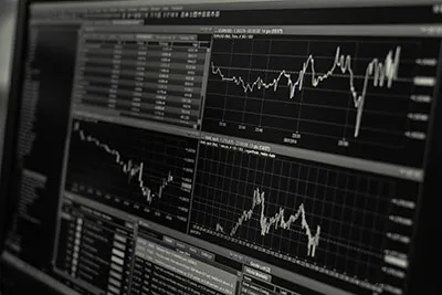 Greater Business Intelligence with Graphs represented by a black and white computer screen with graphs on it